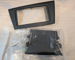 Preview: Conversion kit 1-Din radio bay for Cuore 2007